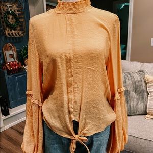 Mock knock balloon sleeve tie front blouse